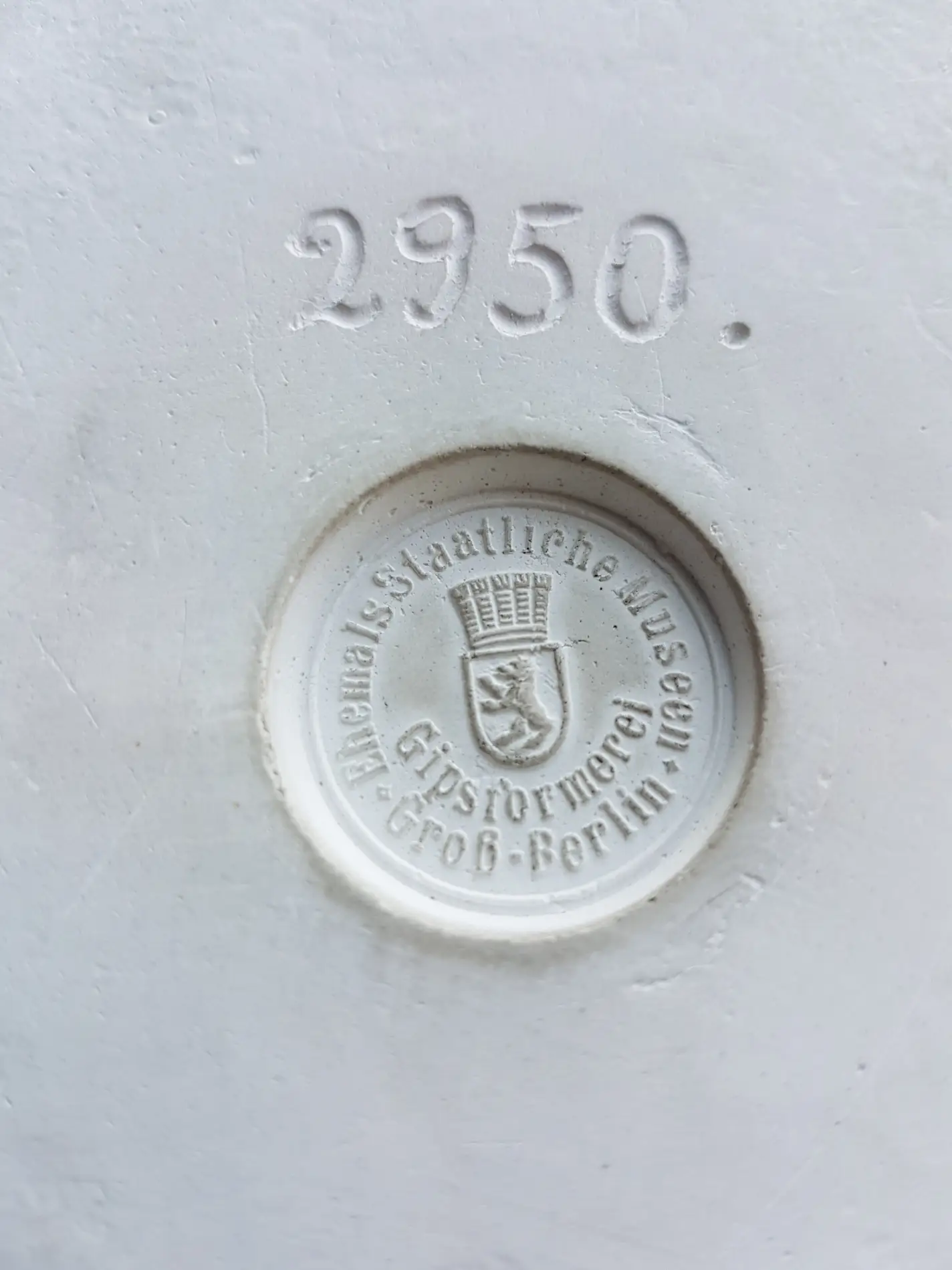 Bodenstempel eines Abgusses eines spätantiken Gefässes