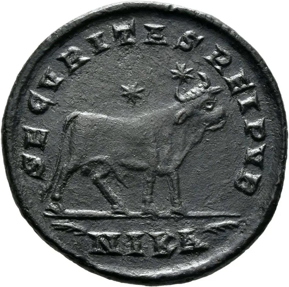 Münze mit geprägtem Stier und um den Rand laufende Schrift